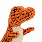 Plush dinosaur chew and play toy for dogs
